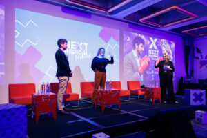 Georgie, Joan and Yacin on the stage at NEXT Medical Festival (1)