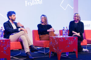 Georgie, Joan and Yacin on stage at the NEXT Medical Festival 2026