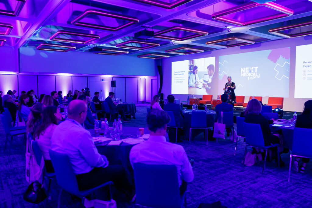 Victoria Ho talking to an audience at Next Medical Festival