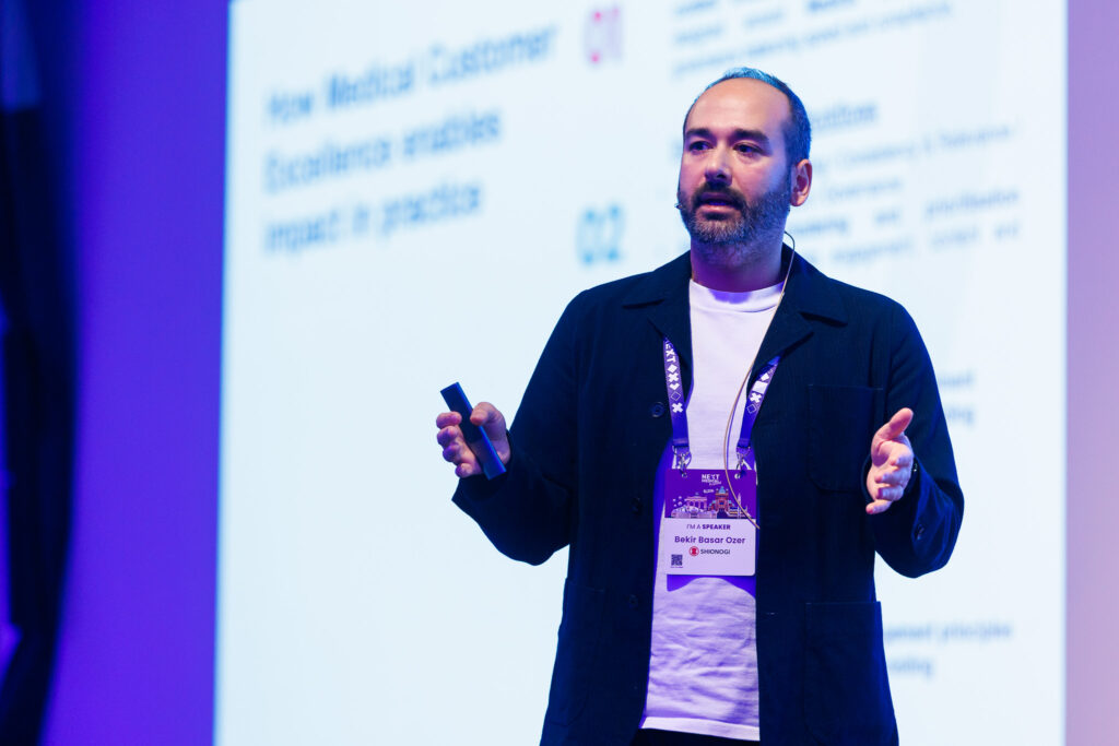 Bekir Basar Ozer on the stage at Next Medical Festival