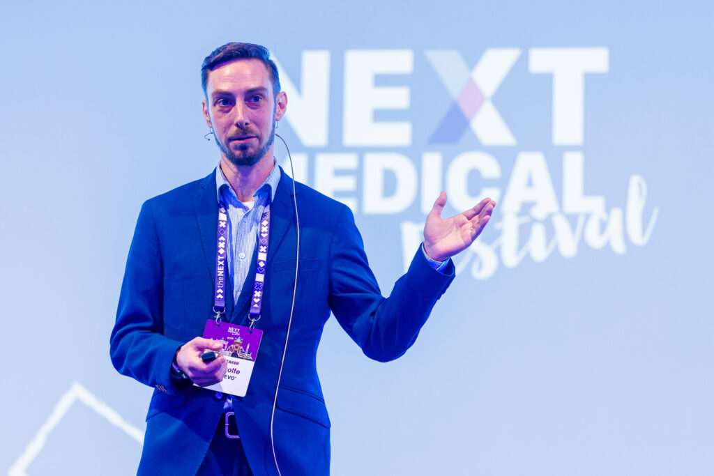 Sam Rolfe on stage at Next Medical Festival