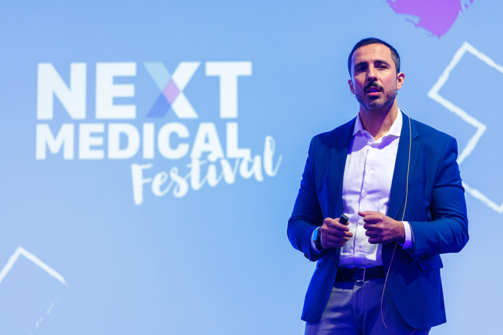Mussa Arvani on stage at Next Medical Festival